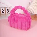 Faux rabbit fur cosmetic bag in rose pink with ribbed texture and plush pom-pom handle - Rose Red