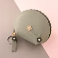 Short grey-green lychee leather coin purse with wave edges and pearl flower decor - Green