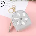 Grey mini backpack coin purse with sunflower detail and gold keychain clip - Gray