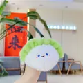 Cute plush cabbage keychain with embroidered smiley face in green and white plush material - Cabbage Dumpling (Chain)