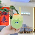 Cute green plush coconut drink keychain with a straw and smiling character face - Milk Tea (Chain)