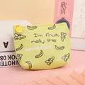 Close-up of yellow PU leather coin purse featuring green banana pattern and sturdy zipper - Yellow Banana