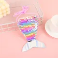Close-up of sparkling gradient sequins and silver mermaid tail on a pink crossbody purse - Light Multi-color