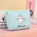 Close-up of a light blue cartoon cat coin purse with green zipper and metal puller - Light Blue Hat Cat
