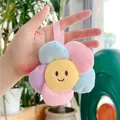 Llavero de girasol de peluche colorido con pétalos macaron y cara sonriente bordada - Lazo de cinta / Rosa