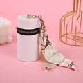 Mini borsa cilindrica in pelle bianca con foulard a catena e gancio dorato su rosa - Bianco