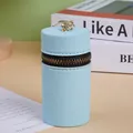 Minimalist light blue cylindrical leather coin purse with golden zipper and metal clip - Blue