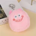 Close-up of pink plush monster keychain with soft fur, embroidered face and silver metal clasp - Pink (Two Gray Eyes)