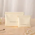 Beige PU leather pouch in small and large sizes with gold lettering and spring closure - Large (18x14cm) / Milk Apricot White