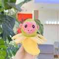 Close-up of creative banana monkey plush keychain with soft yellow peel and green head - Banana Monkey (Iron Ring)