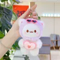 Detailed macro shot of a plush white teddy bear keychain with pink heart and sunglasses - Hanging Chain Style / Purple