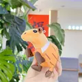 Close-up of cute orange Capybara plush keychain with brown limbs and white collar strap - Coconut Guinea Pig/Capybara (Iron Ring)