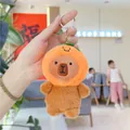 Close-up of capybara plush keychain wearing an orange hat with silver metal keyring - Orange Style (Orange with Chain)