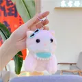 Close-up of pink and white plush cat keychain with blue sunglasses and lace bib detail - Hanging Chain Style / Pink