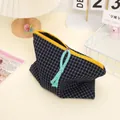 Navy blue checkered canvas makeup bag with contrast yellow zipper and blue fringe puller - Black White Grid