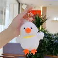 Close-up of a white plush duck charm with orange beak and golden metal keychain - Yellow Stripe White Hat Duck / Plain Chain