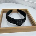 Handmade black woven raffia headband featuring a stylish top knot and wide texture - Black
