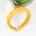 Braided fabric headband in bright yellow featuring a stylish twisted rope design for women - Turmeric