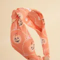 Orange Halloween headband featuring pumpkin and ghost prints with a top knot style - Orange Pumpkin