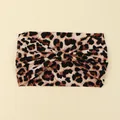 Detail view of a wide leopard print headband with a stylish front knot design - Leopard Print
