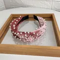 Pink velvet knotted headband with white pearls and comfortable end tips - Pink