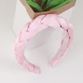Pink braided satin headband with thick fabric twist design for a stylish sweet look - Light Pink