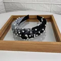 Two-tone grey and black velvet knotted headband with elegant white pearl embellishments - Gray