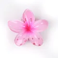 Haarklammer in pinker Frangipani-Form mit Farbverlauf und glänzender Oberfläche - Reinheit / Rosa