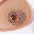 Coletero marrón de felpa con mini pompones de colores y textura de punto elástico - Marrón