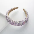 Close-up of purple stone and pearl headband with comfortable soft velvet lining - Purple