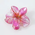 Macro detail of a pink plumeria hair claw clip with a pearlescent gradient finish - Large (8cm) / Iridescent Rose Red