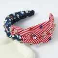 Detailed macro view of knotted headband with USA flag rhinestones and enamel charms - Horizontal Stripes