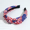 Padded knot headband with US flag pattern and colorful faux pearls on white prop - Stars Stripes Knotted Pearl Style / Red