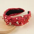 Close-up of red spider web headband with knots, pearls and square rhinestones details - Spider Web (Red) / Red