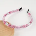 Detailed view of pink and white knitted headband with sparkling silver tinsel threads - Pink White