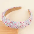 Dettaglio ravvicinato di perline colorate e paillettes smiley su cerchietto imbottito - Azzurro
