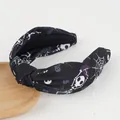 Halloween knot headband featuring black fabric with skull, skeleton and spider web prints - Skull & Spider Web Style / Black