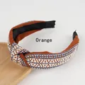Diadema vintage naranja con nudo trenzado y patrones geométricos étnicos elegantes - Naranja