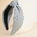 Detail of light blue denim knotted headband with crystal rhinestones and gold metal edges - Light Blue