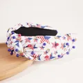Knotted American flag headband with patriotic stars, stripes, pearls, and rhinestones - White