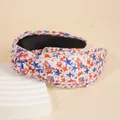 Knotted headband featuring American flag stars and stripes pattern in red blue and white - Flag Big And Small Stars