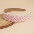 Detail of pink wide headband with embedded white pearls and pink crystal beads on wood - Pink