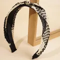 Bohemian black and white braided headband with stylish amber-textured resin buckle detail - Black and White