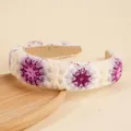 Bohemian crochet headband featuring knit purple and pink flowers on a beige base - Purple
