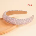 Detail of pink rhinestone padded headband with sparkling crystals and silver glitter base - Pink