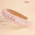 Detailed close-up of a pink rhinestone headband with padded sponge and square gems - Pink