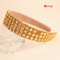 Close-up of luxury wide headband with white rhinestones and soft inner lining - White