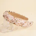 Close-up of a wide Baroque headband with colorful crystals and soft brown velvet lining - Light Pink