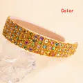 Detailed view of luxury wide headband featuring multi-color crystals and gold beadwork - Colorful