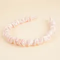 Elegant pink satin scrunchie headband with a smooth glossy silk-like texture - Light Pink